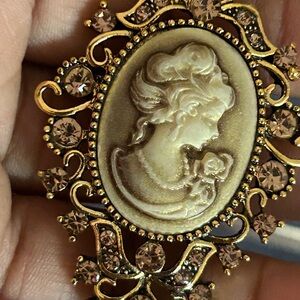 Elegant Gold Cameo Brooch